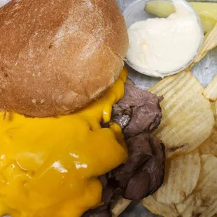a beef sandwich and chips