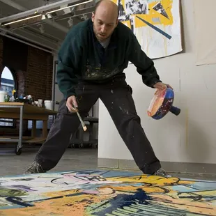 Artist-in-Residence Howard Sherman, working in his studio