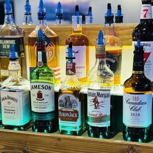 a variety of liquor bottles