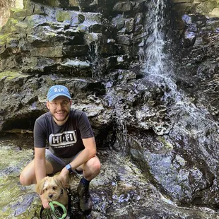 Erik and Theo by the waterfall at the top of the hike