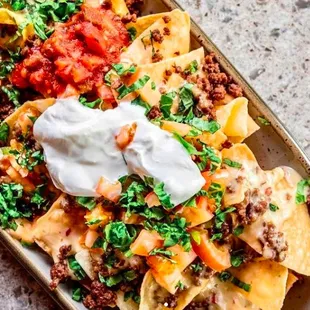 a tray of nachos topped with sour sour sour sour sour sour sour sour sour sour sour sour sour sour sour