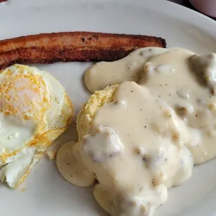 Special biscuit and gravy with egg and bacon.