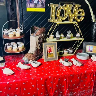 a table with cupcakes