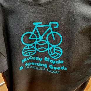 This is the original McCully Bicycle and Sporting Goods logo.
