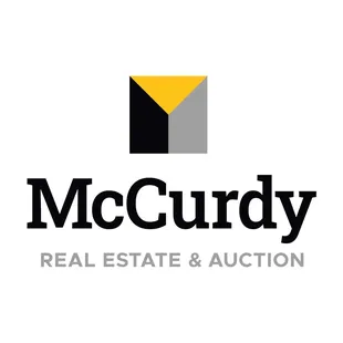 McCurdy Real Estate &amp; Auction Logo
