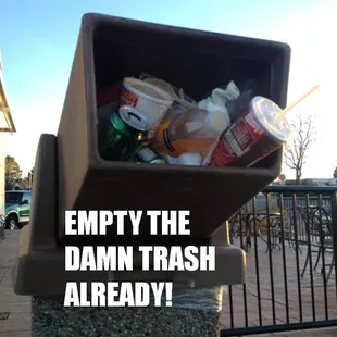 Unacceptable. And right during a high traffic period.  This trash can didn't get that way in 5 minutes, folks.  Do your chores.