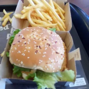 hardest chicken ever and wtf is the black shit on the bun??