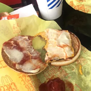 a half eaten sandwich and a half eaten sandwich