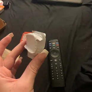 a person holding a remote control