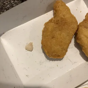 a fried chicken and a cup of coffee