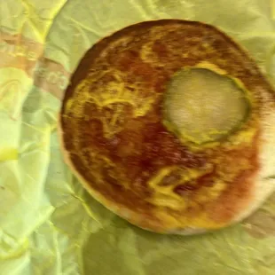 Pickles and ketchup and mustard no meat very pissed off