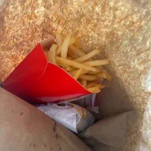 french fries in a paper bag