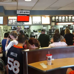 a large group of people in a restaurant