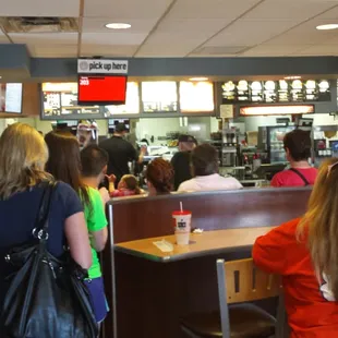a large group of people in a restaurant