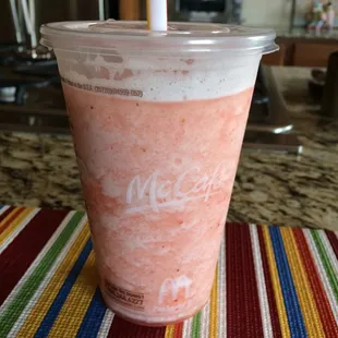 a smoothie in a plastic cup