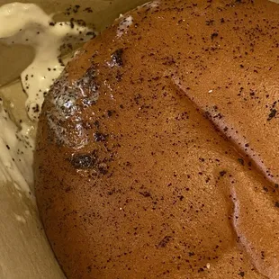 Filet of fish with gross stuff all over it