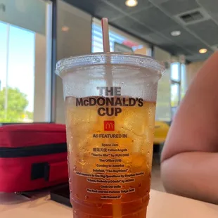 a cup of iced tea on a table
