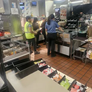 workers working in a restaurant kitchen