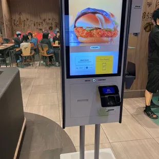 a digital ordering kiosk in a restaurant