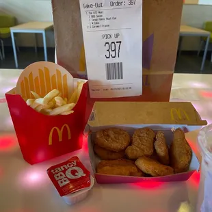 a box of french fries and a box of donuts