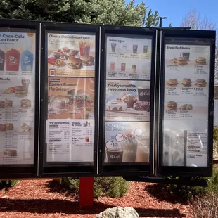 menus and prices displayed on a sign