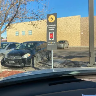 Waiting in the curbside pickup for my order. My dog loves McNuggets and car rides. Today he gets both for being a good boy.
