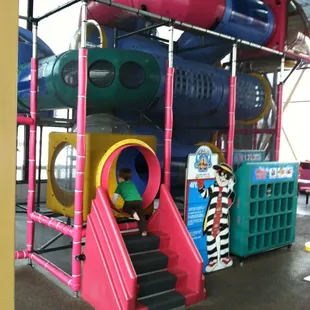 Mega play area with lots of seating in the play area.