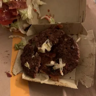 The patty on the burger in three separate pieces that don't  even line up with one another.
