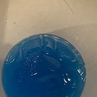 a blue liquid in a bowl