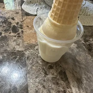 Delicious soft serve vanilla cone with dinner