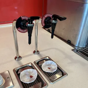 three empty plates on a counter