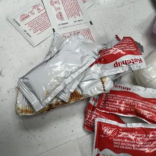 a variety of packets of food on a table