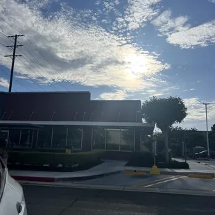 the sun shining through the clouds