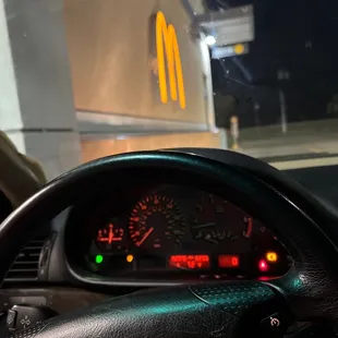 the dashboard of a car at night