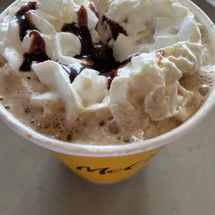 a cup of hot chocolate and whipped cream