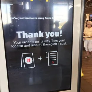 a thank you sign at a fast food restaurant