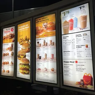 menus and prices displayed on a wall
