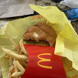 Double cheeseburger with fries.