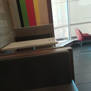 a table and chairs in a restaurant