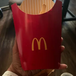 A large fry with the amount of fries that should probably be in a medium box.