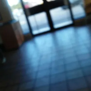 a blurry picture of a restaurant entrance