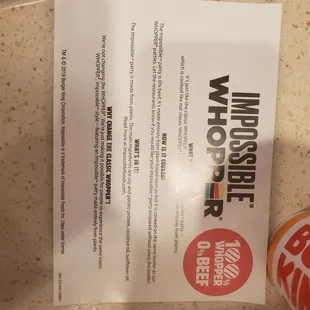 a menu and a cup of coffee