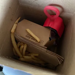 french fries in a brown box