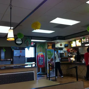 customers at the counter in the restaurant