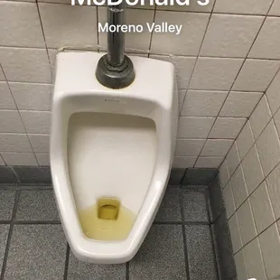 Peeing stall still clogged &amp; overflowing.  No paper towel dispensers yet they give paper towel when you order.  Annoying!!!