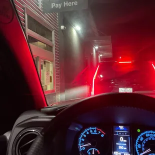 a view from inside a car at night