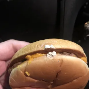 Something on/baked in the cheeseburger