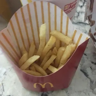 This what my fries looked like in my combo. Looks half eaten already and cold.