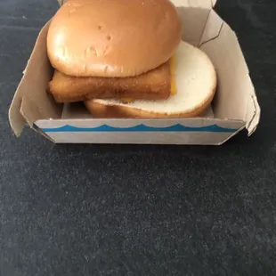 Filet-O-Fish sandwich NOT packaged correctly and sauce push out on back of box