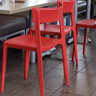 a table and chairs in a restaurant